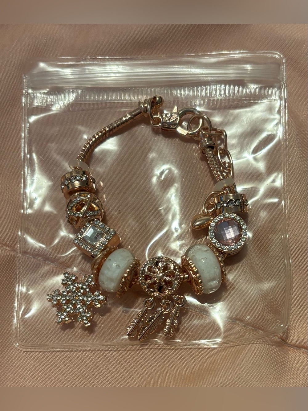 Pink -Tone Charm Bracelet with White and Clear Accents
